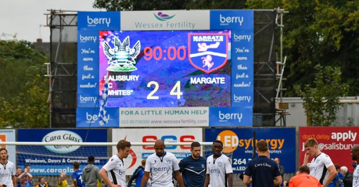 LED Scoreboard displaying live footaball scores and time