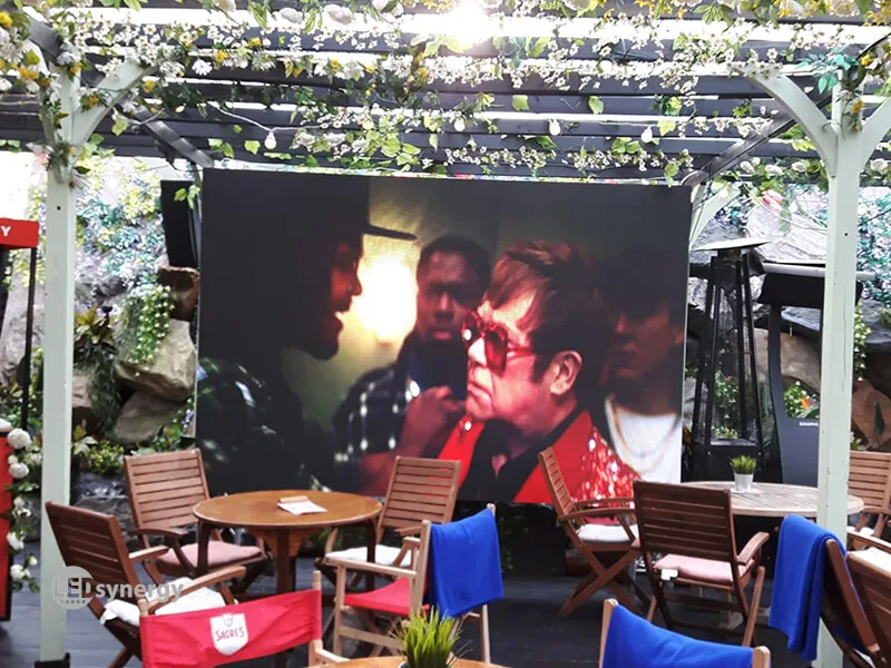 Beer garden TV showing Elton John